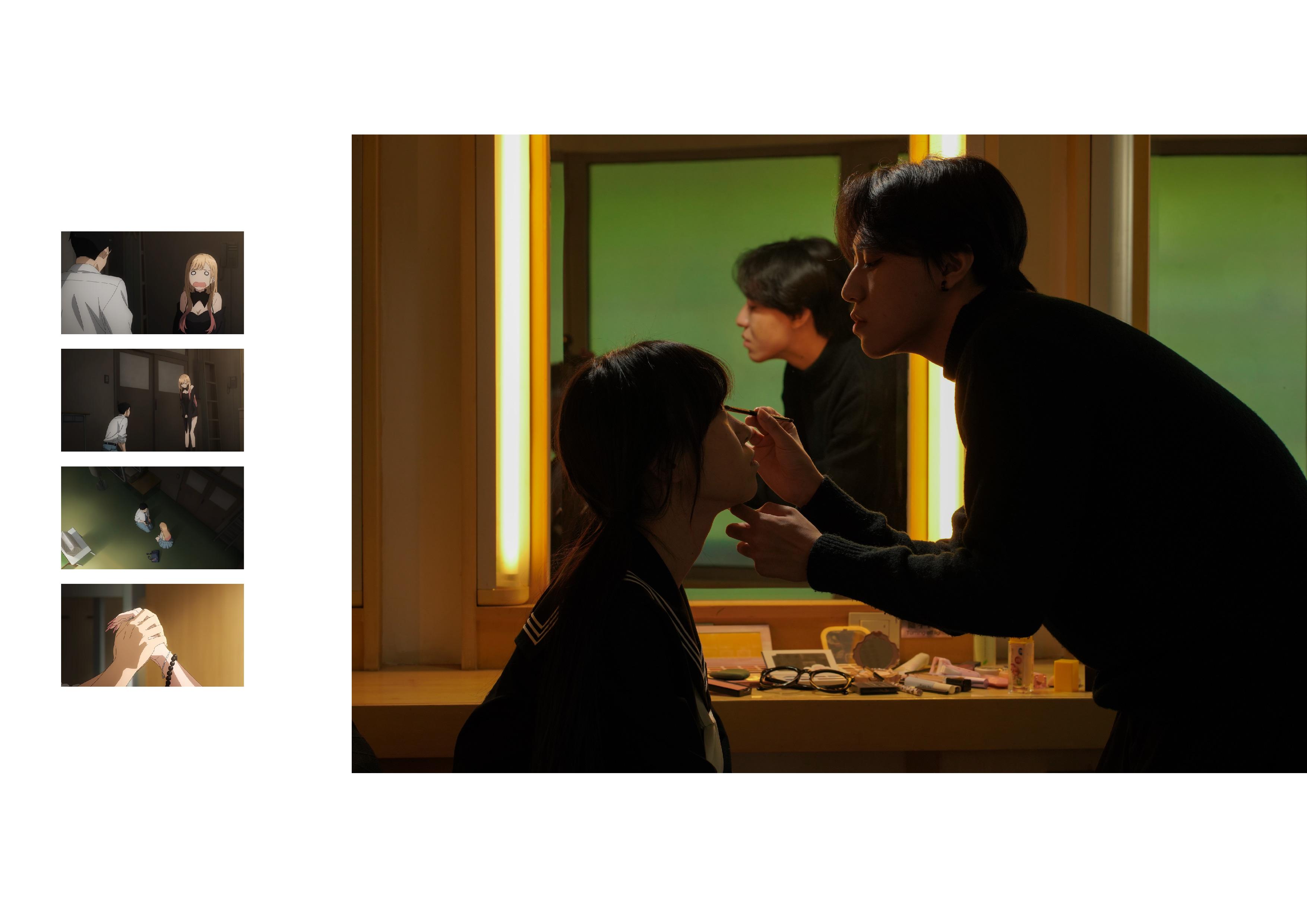 A man applying makeup to a seated woman in front of a mirror