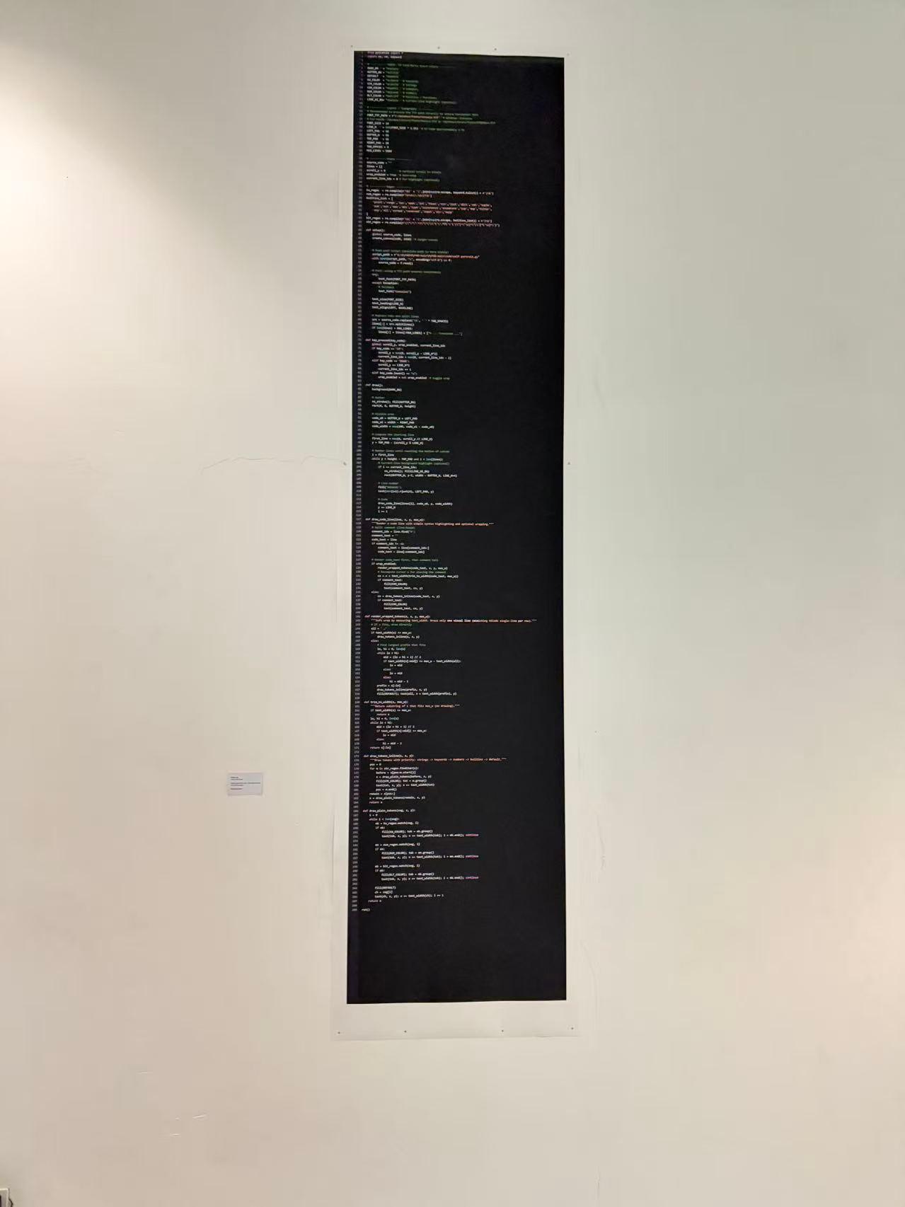 This Is Not Code installed vertically on a white gallery wall